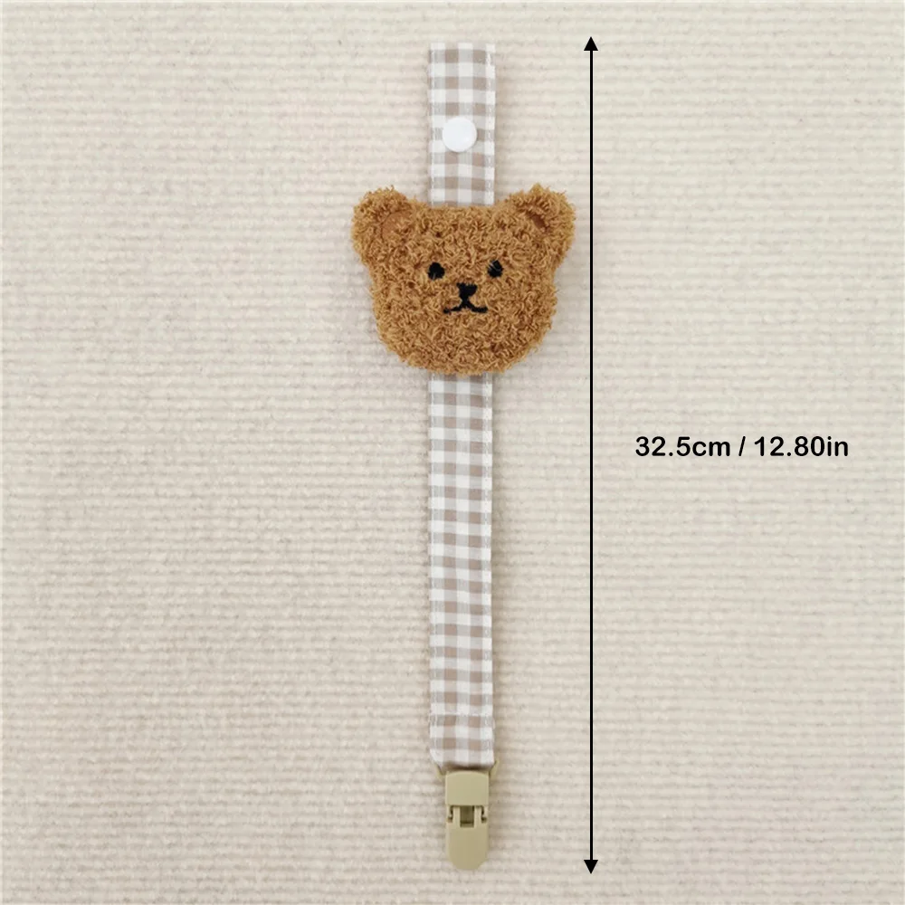 attache tetine pratique