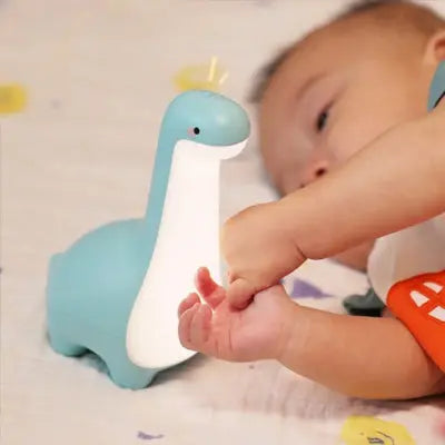 Veilleuse bébé dinosaure bleu