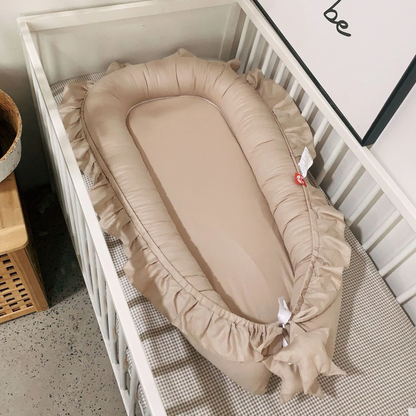 Réducteur de lit bébé