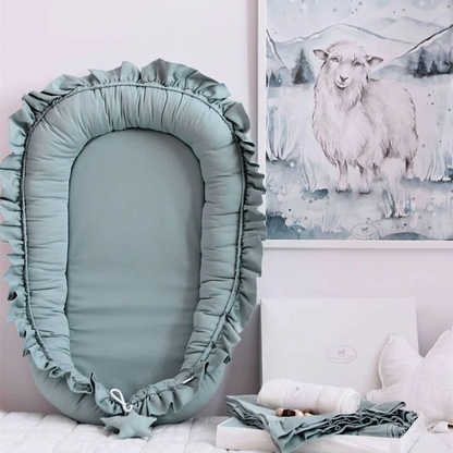Réducteur de lit bébé