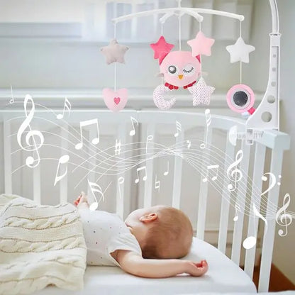 Bébé endormi avec Mobile Bébé Étoile musical  360° pour fille suspendu au-dessus d’un berceau 