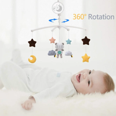 Bébé regardant un mobile étoilé rotatif à 360°