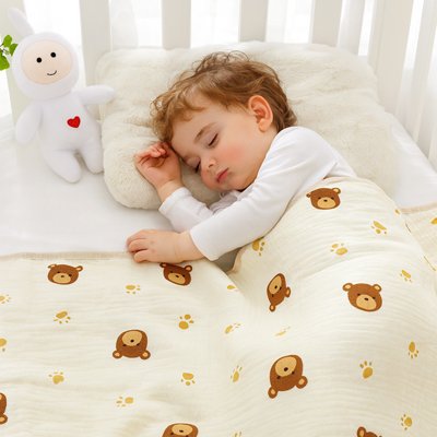 Couverture bébé blanc casse motif pied d'ours