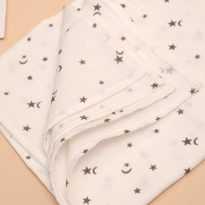 Couverture légère bébé en mousseline imprimée lunes et étoiles