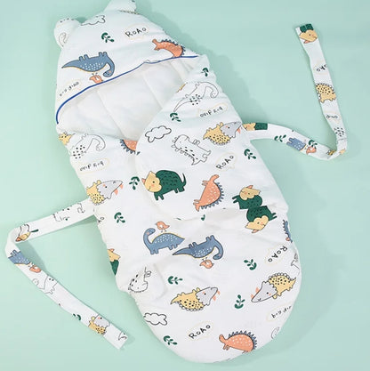Couverture pour emmailloter bébé dinosaures, rabats et liens à nouer
