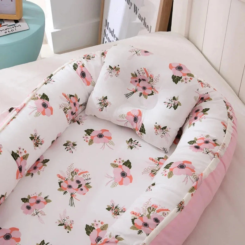 Détail de l'imprimé fleuri du nid bébé Bégonia Rose