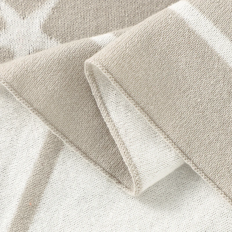 Gros plan sur le tissu en coton d'une couverture étoile pour bébé