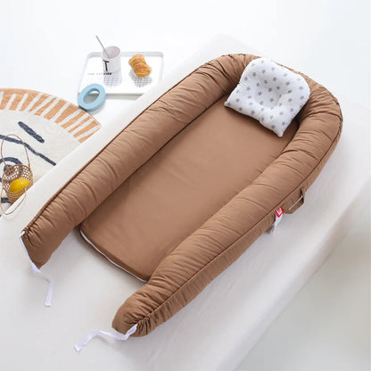 Réducteur de lit bébé | Marron