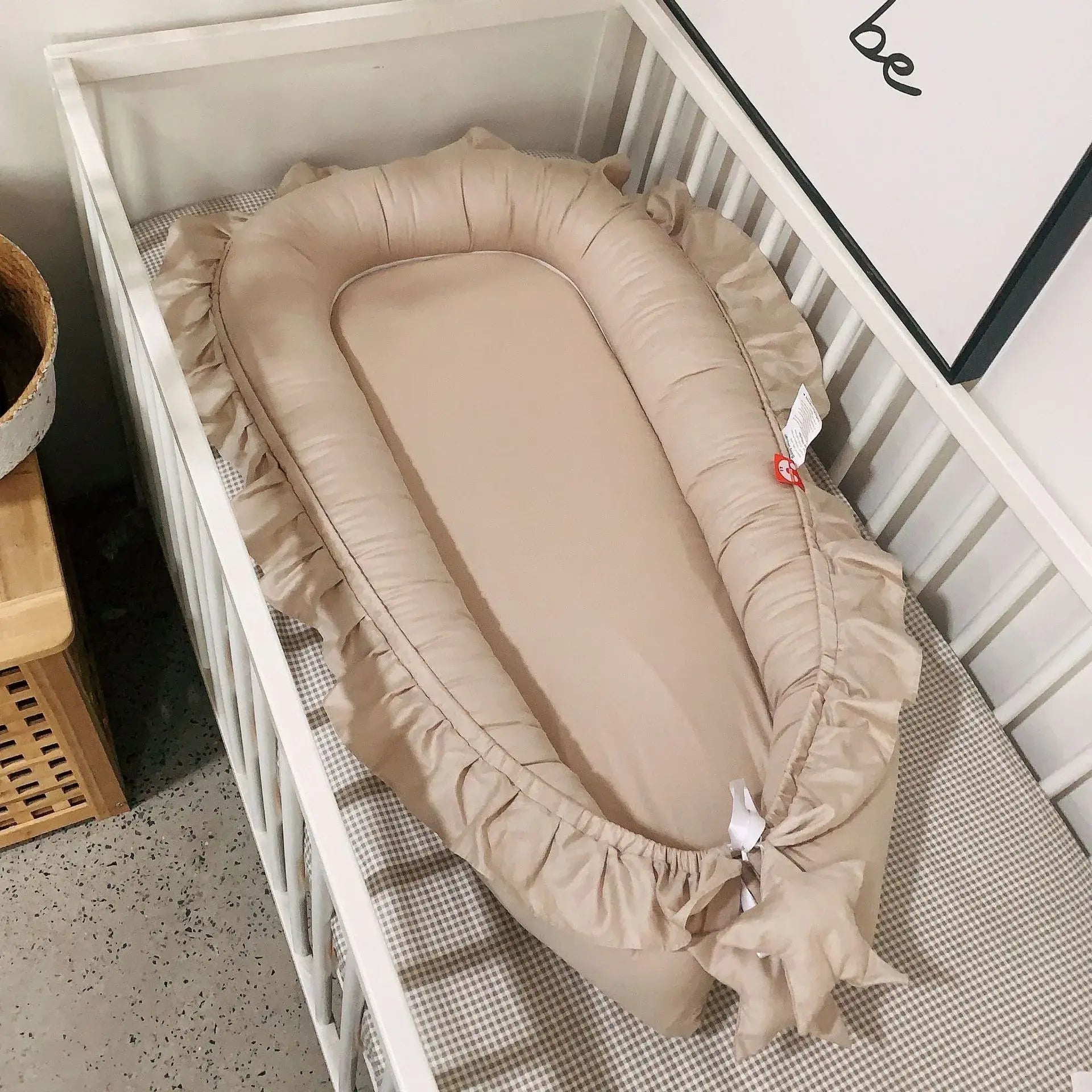 Réducteur de lit bébé Nid Portable – bébé endormi dans nid