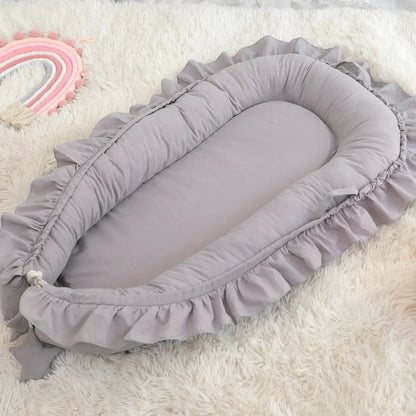 Réducteur de lit bébé Nid Portable – coloris gris dou