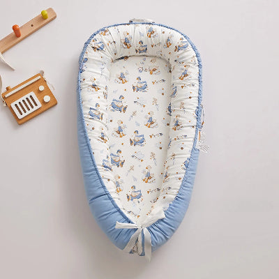 Réducteur de lit bébé cocon bleu clair
