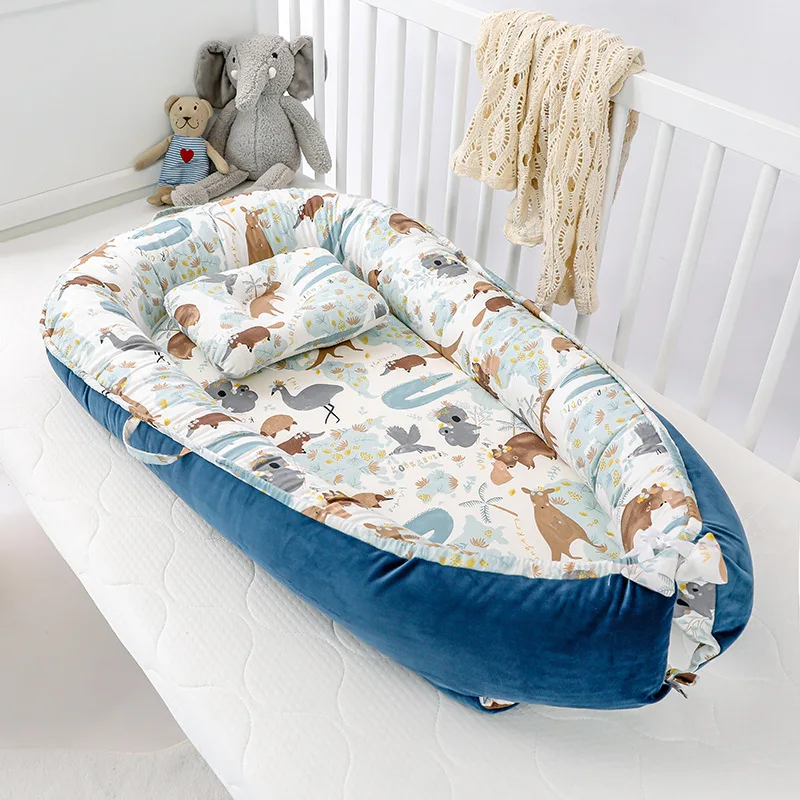 Réducteur de lit bébé motif animal
