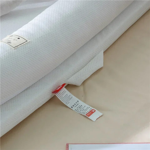 Réducteur de lit respirant pour bébé