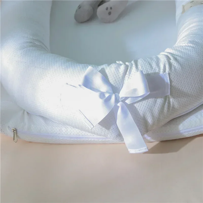 Réducteur de lit respirant pour bébé