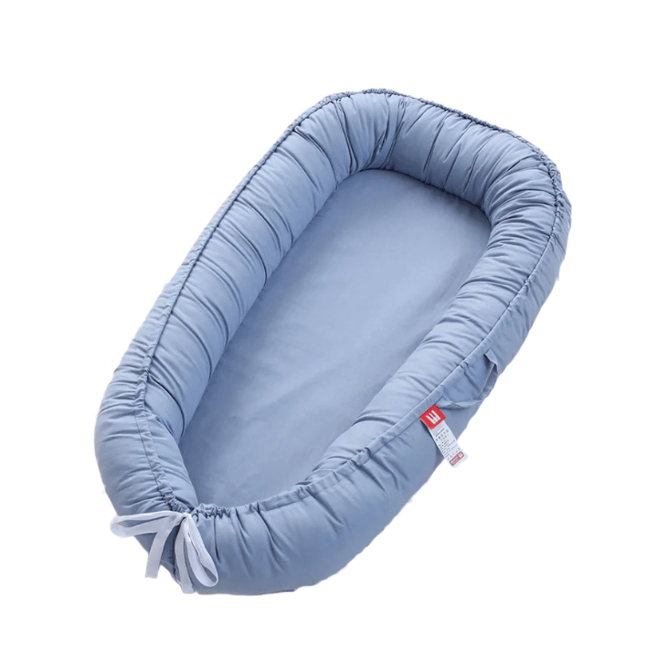 Réducteur de lit bébé | Cocoon Voyage