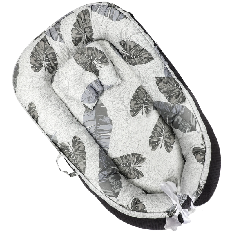 réducteur de lit respirant bébé – cocon motif feuilles