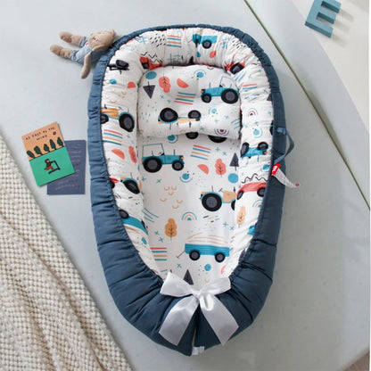 Réducteur de lit bébé | NideTendresse