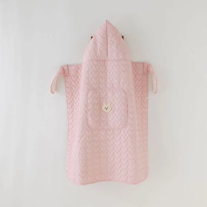 couverture de portage rose posées à plat