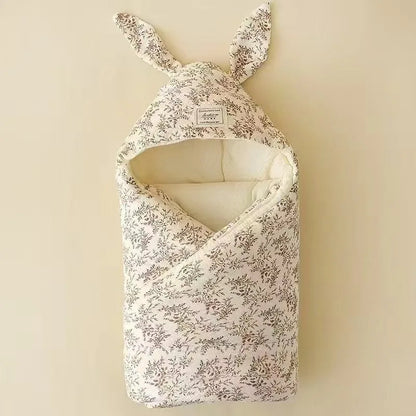 couverture emmaillotage hiver motif fleurs
