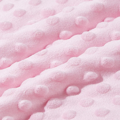 Couverture polaire pour bébé rose, détail des bulles en relief