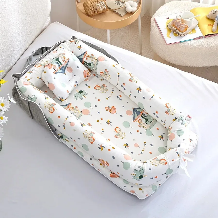 réducteur de lit évolutif pour bébé