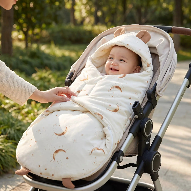nid d'ange bébé hiver motif lunes et étoiles