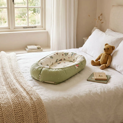 réducteur lit bébé ajustable et confortable