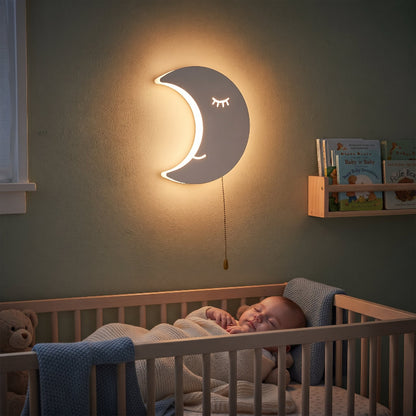veilleuse lune bébé allumée pendant la nuit